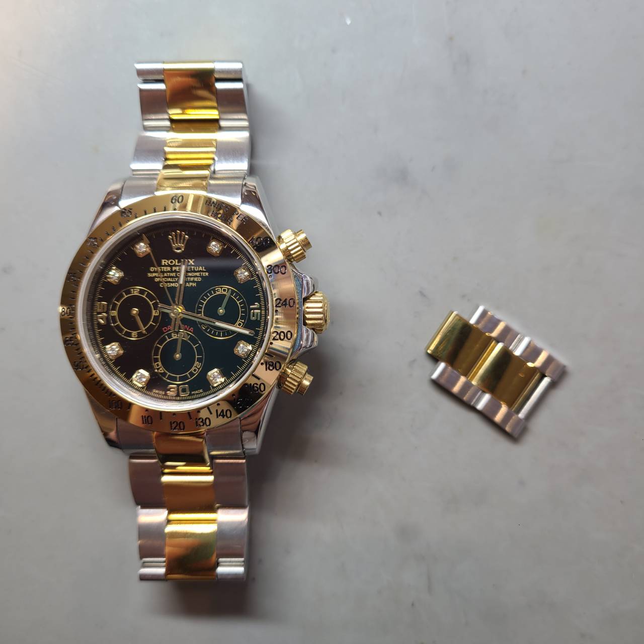 ロレックス (ROLEX) デイトナ の腕時計のコマ調整